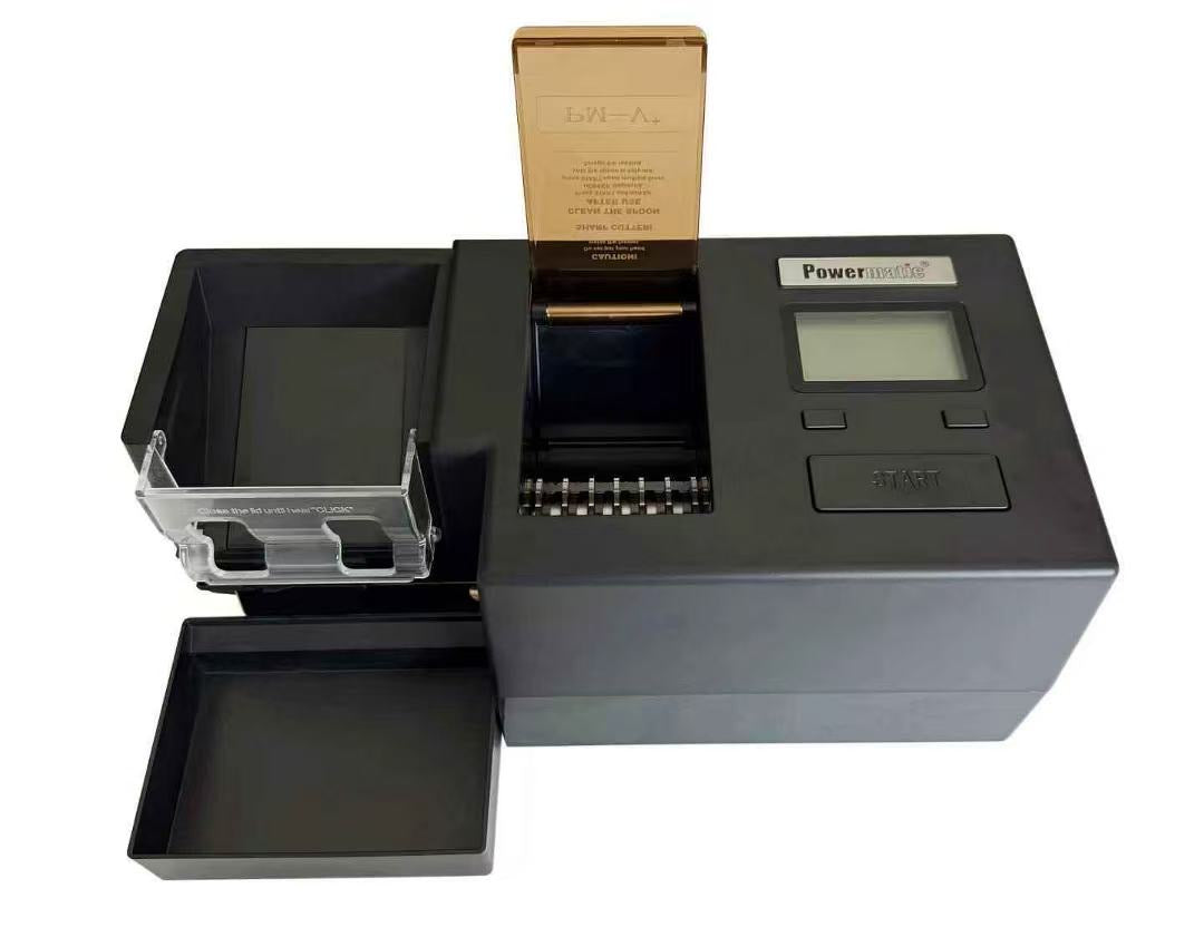 Front angle view of black Powermatic 5 electric cigarette injector machine with digital display on white background